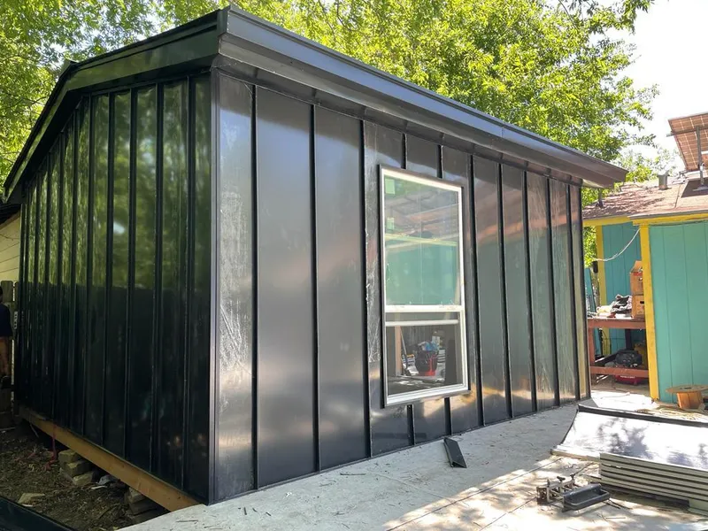 Black standing seam metal wall panels for Metal Roof Installation in Dothan